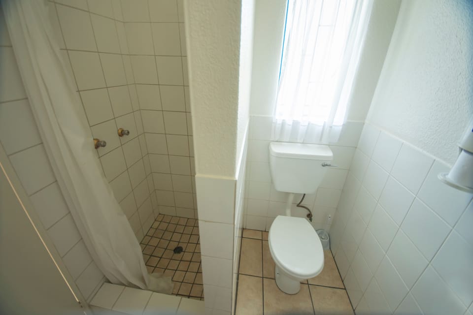 Standard Room | Bathroom | Shower, towels