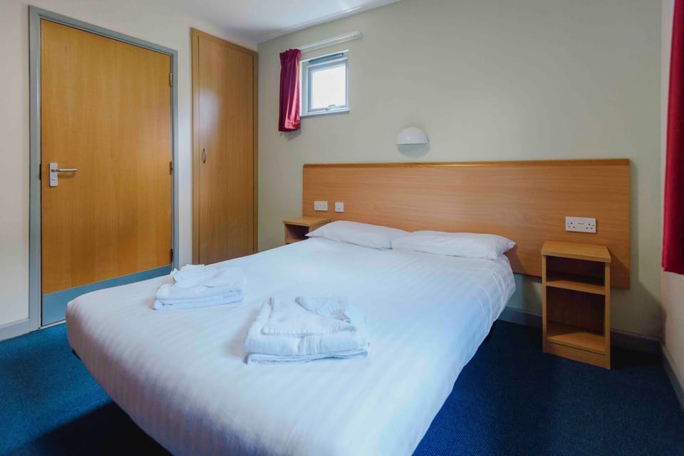 Economy Double Room, 1 Double Bed | Blackout drapes, free WiFi, bed sheets, wheelchair access