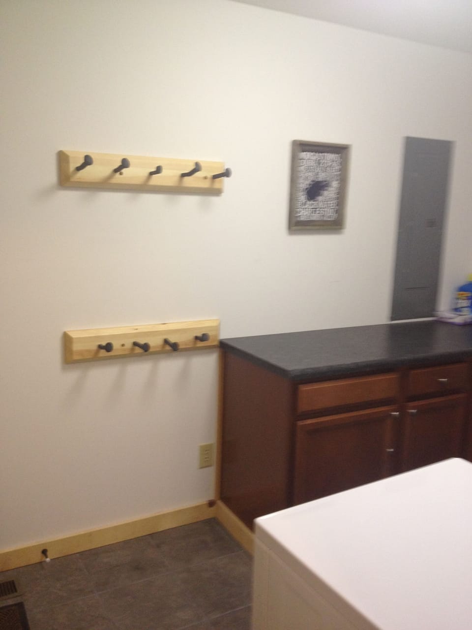 Laundry/mud room- lots of hooks to dry clothes on