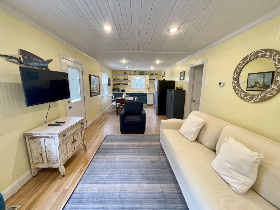 Living Area with TV, First Floor with Screened Porch Access