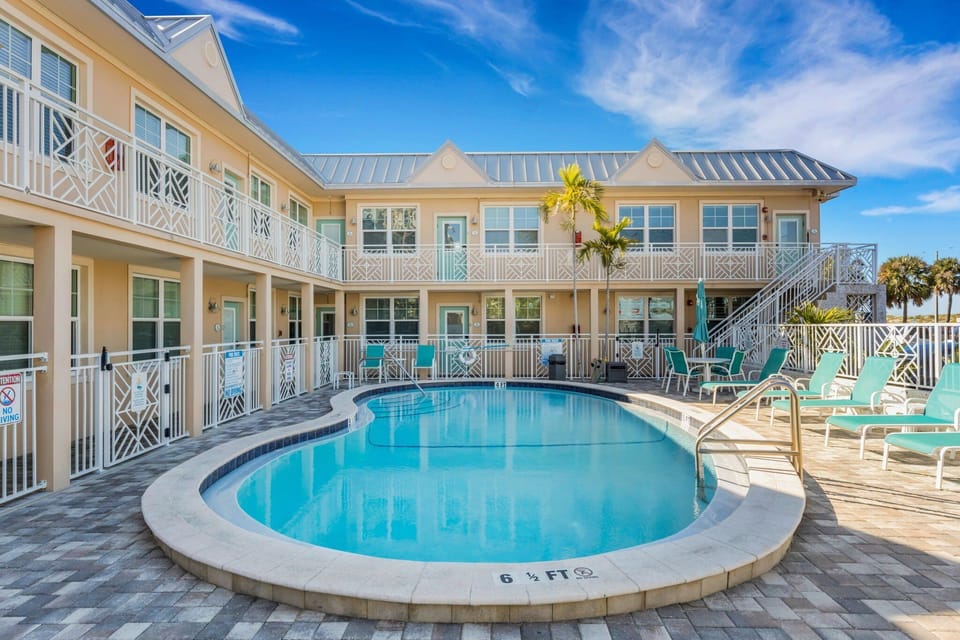 Relax in the private, gated courtyard featuring a heated pool