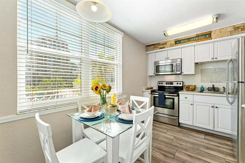 Fully Equipped Kitchen – Includes fridge, stove, oven, microwave, and Keurig coffee maker.