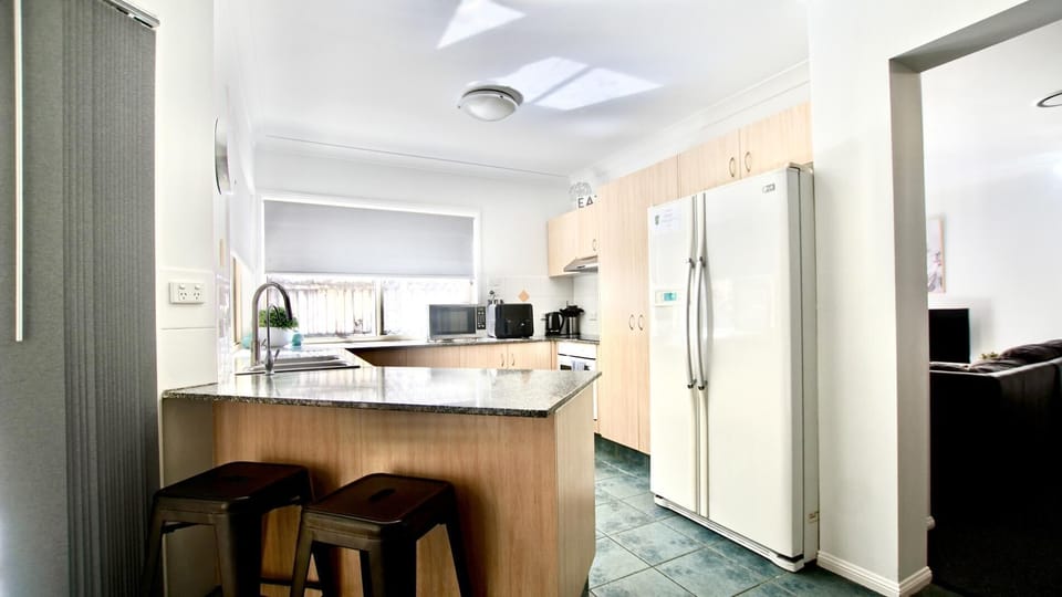 Kitchen - Air fryer, rice cooker, slow cooker, Toasted press, coffee machine loads of cooking utensils