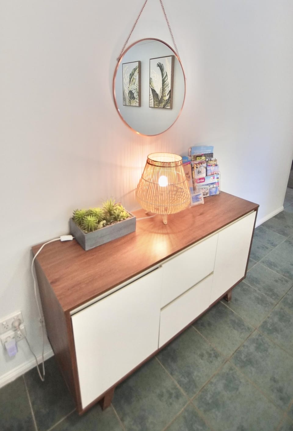 Side board with Tourism Brochures and table place mats