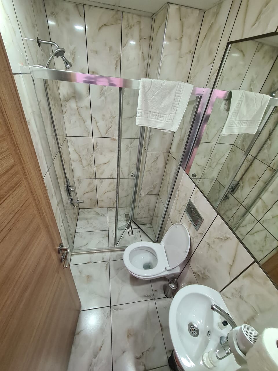 Shower, free toiletries, hair dryer, slippers