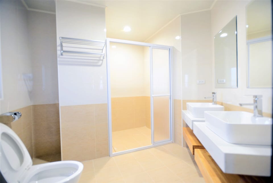 Shower, free toiletries, hair dryer, slippers