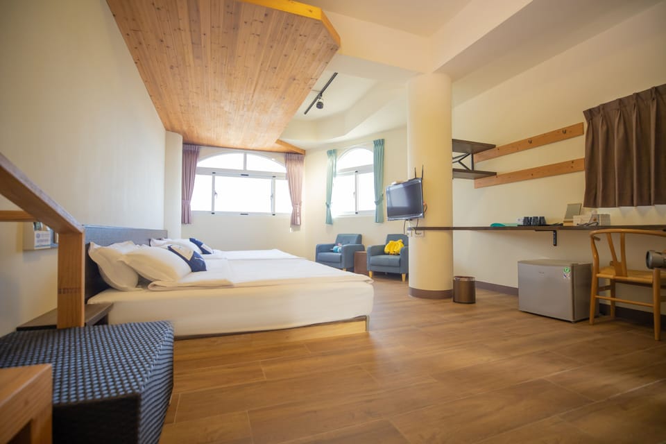 Deluxe Quadruple Room, Multiple Beds, Non Smoking, Partial Ocean View | Desk, blackout drapes, rollaway beds, free WiFi