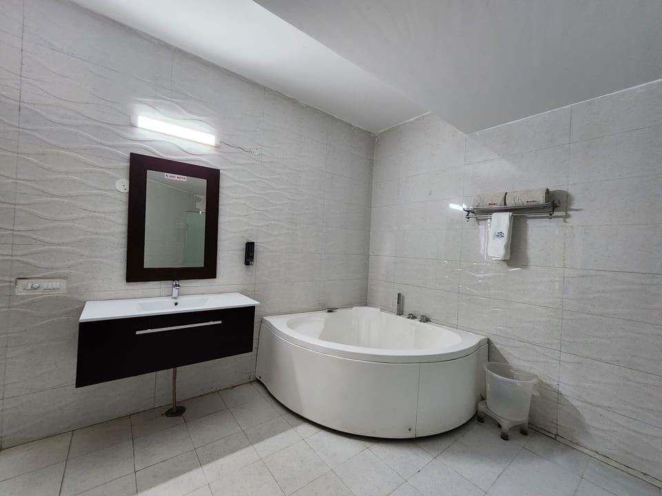 Family Room, 1 Queen Bed | Bathroom | Shower, designer toiletries, slippers, towels