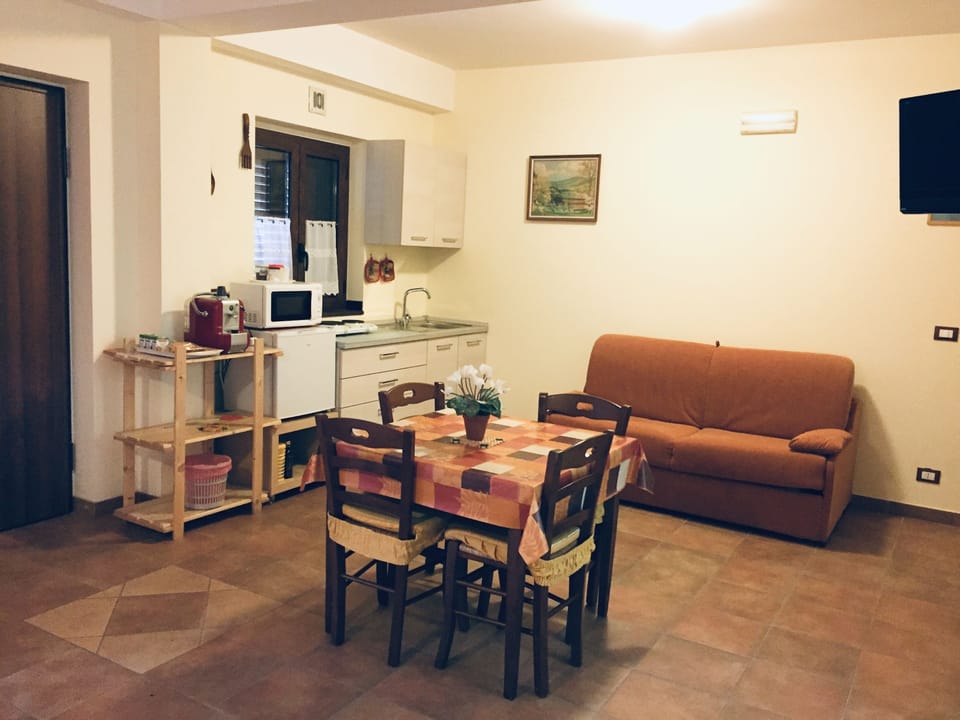 Family Studio, 1 Bedroom (Le Conifere) | Private kitchenette | Fridge, microwave, stovetop, cookware/dishes/utensils