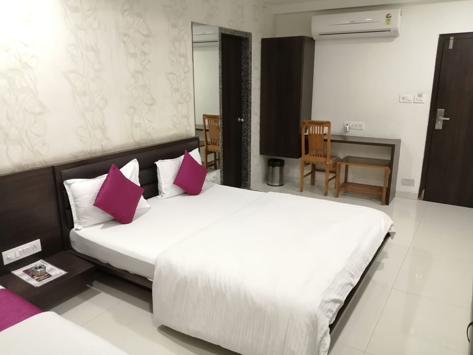 Executive Triple Room | Memory foam beds, individually decorated, desk, free WiFi