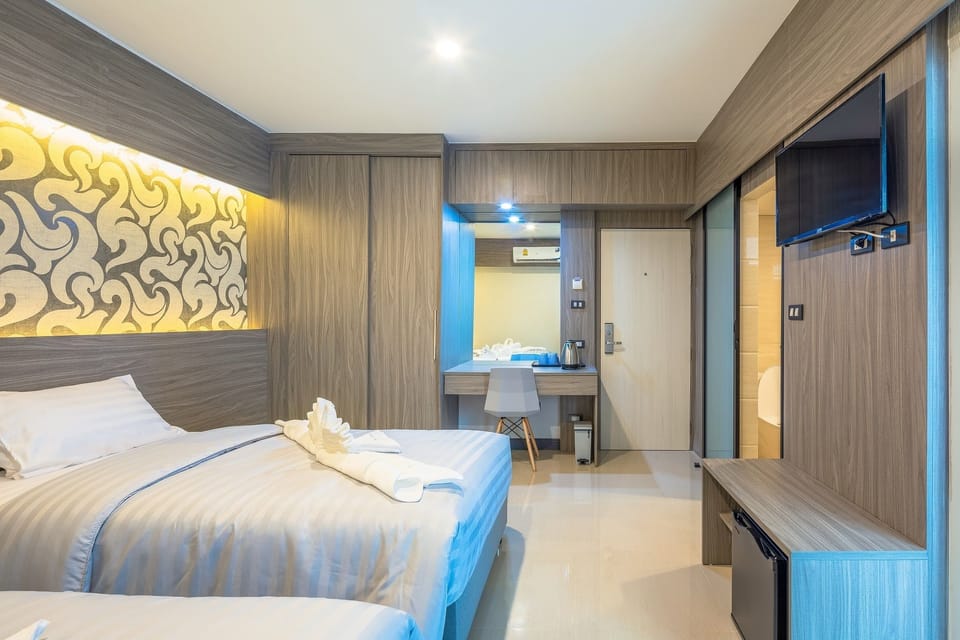 Twin Room with Balcony | In-room safe, desk, free WiFi, bed sheets
