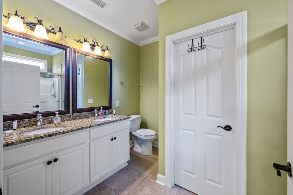 Get ready for a night on the town in this spacious bathroom with double sinks.