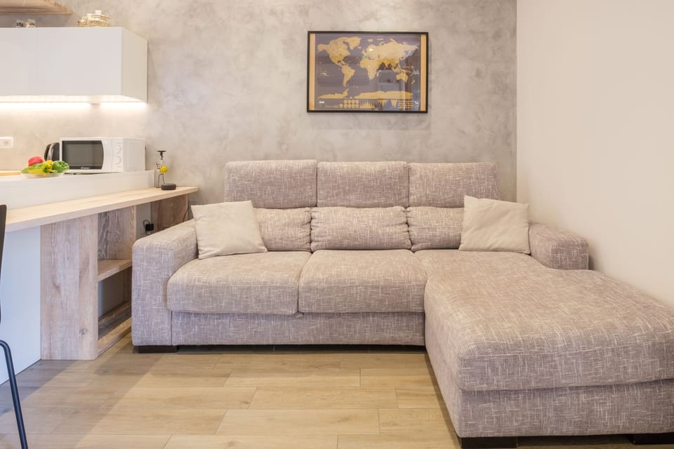 Deluxe Apartment, 1 Bedroom | Living area | Flat-screen TV