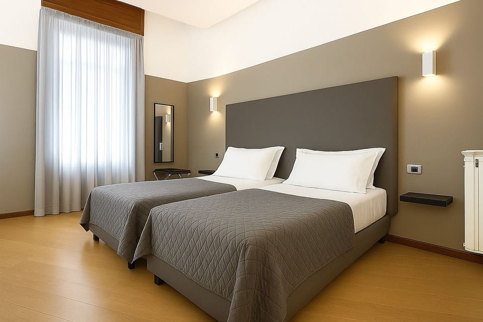 Deluxe Room, 1 Queen Bed, City View | 1 bedroom, premium bedding, minibar, in-room safe