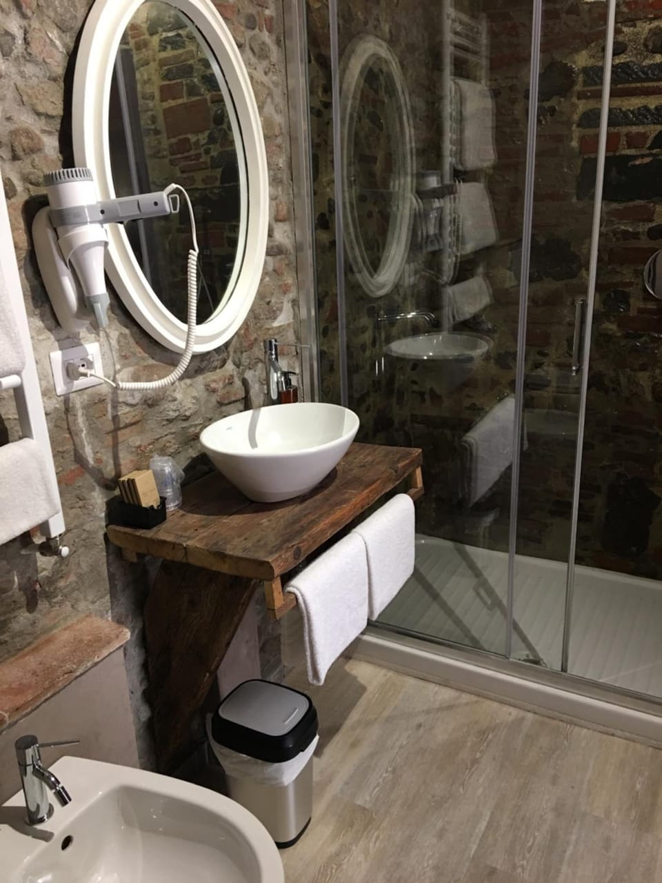 Shower, rainfall showerhead, designer toiletries, hair dryer