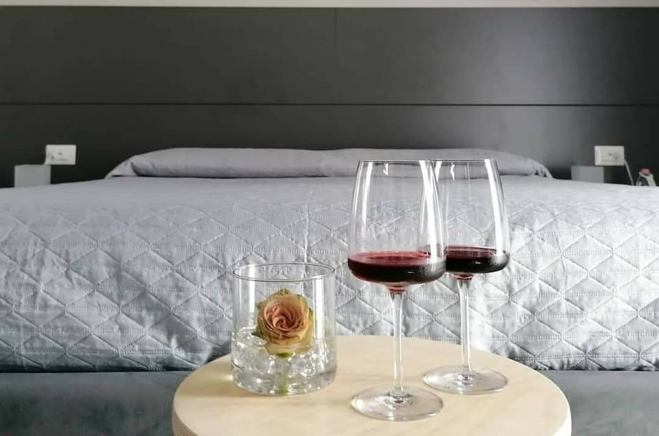 Suite, Balcony | Minibar, in-room safe, desk, blackout drapes