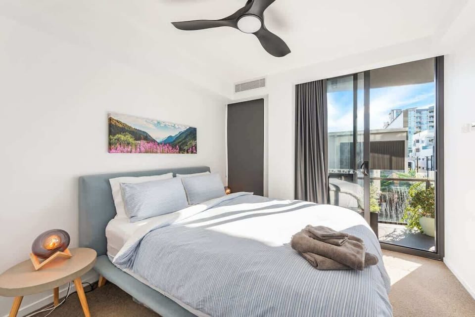 Master bedroom, with ensuite, walk thru wardrobe + opens onto the balcony