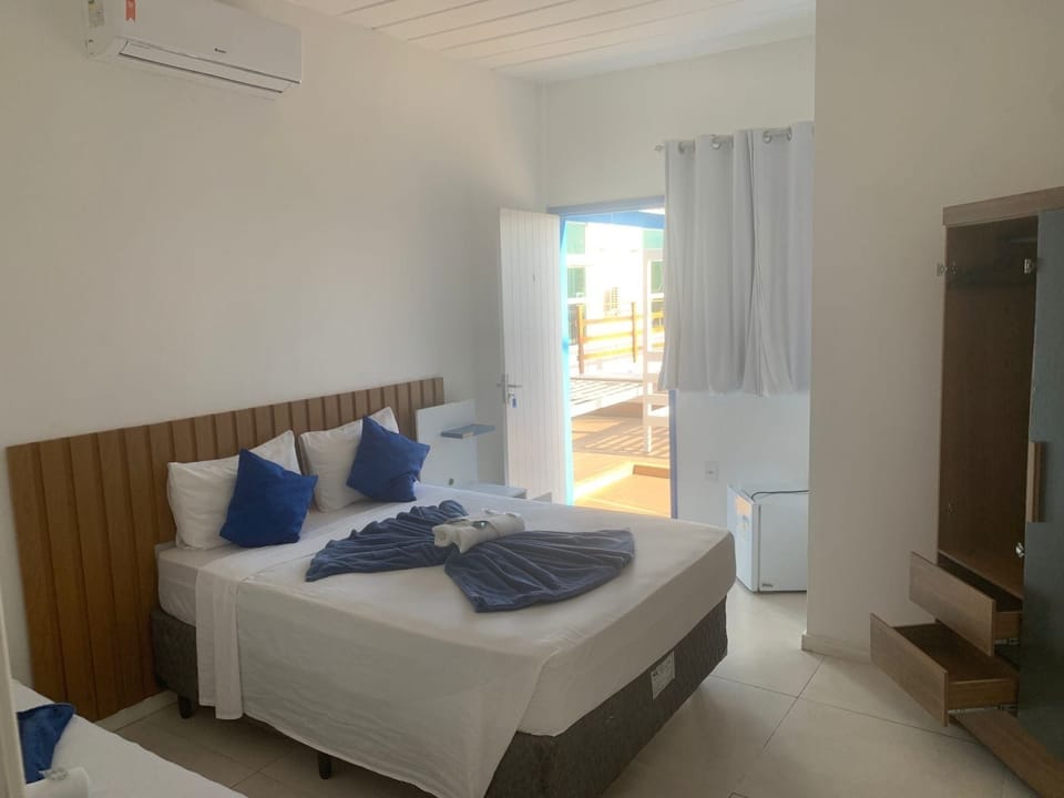 Deluxe Room, 1 King Bed, Pool View | Minibar, in-room safe, blackout drapes, iron/ironing board (on request)