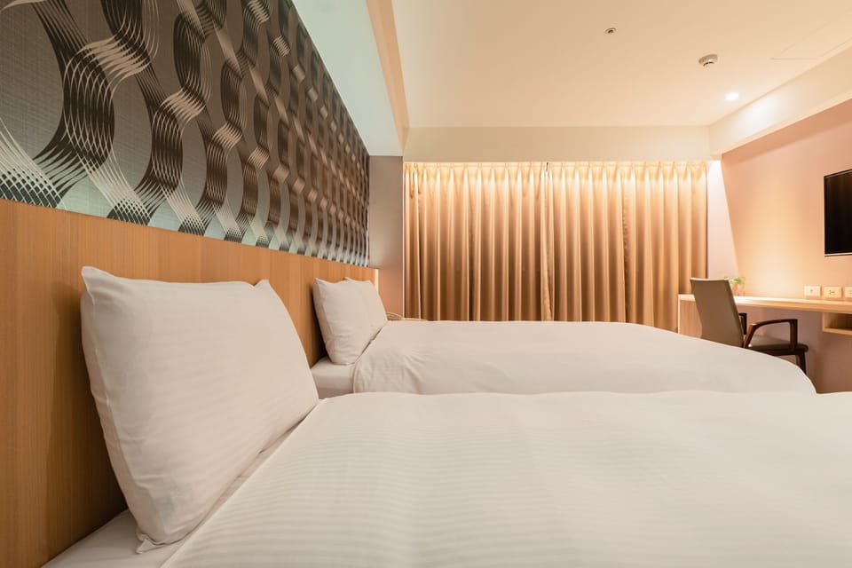 Triple Room | Down comforters, minibar, desk, blackout drapes