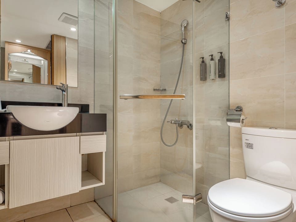Standard Double Room, No Windows | Bathroom | Shower, rainfall showerhead, hair dryer, towels