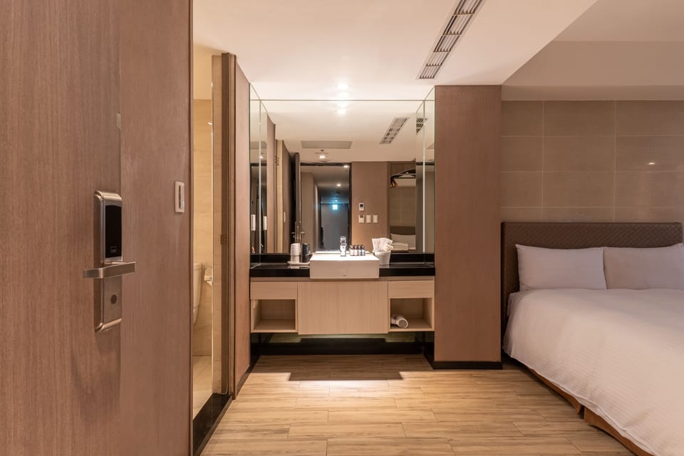 Superior Quadruple Room | Down comforters, minibar, desk, blackout drapes