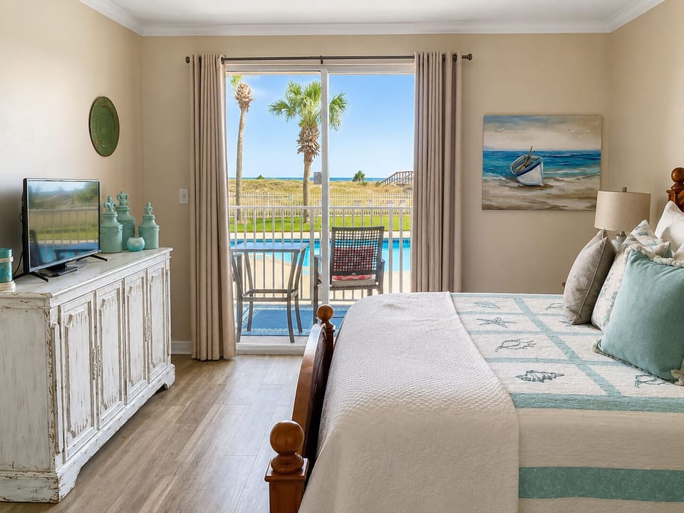 King bedroom with beautiful pool and Gulf just outside your door