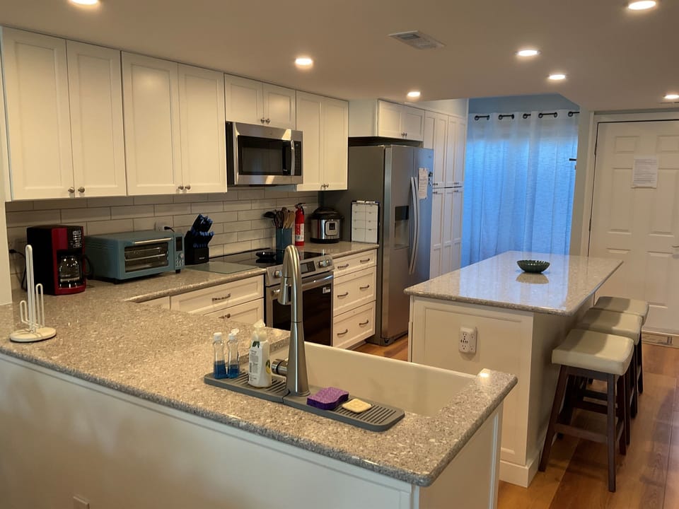 Air fryer oven and outside water dispenser
