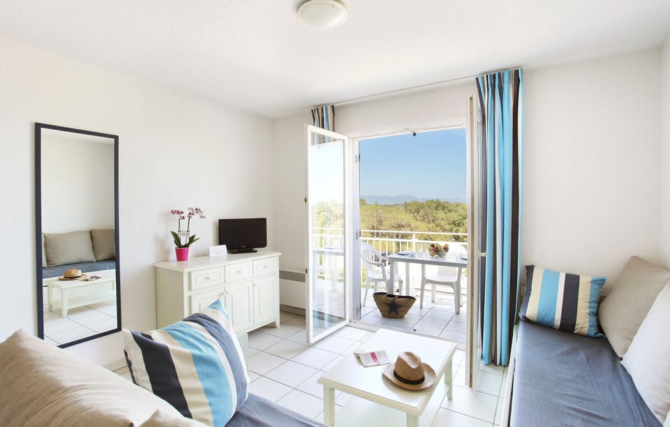 Retreat back to the cozy living room and relax on the sofa.