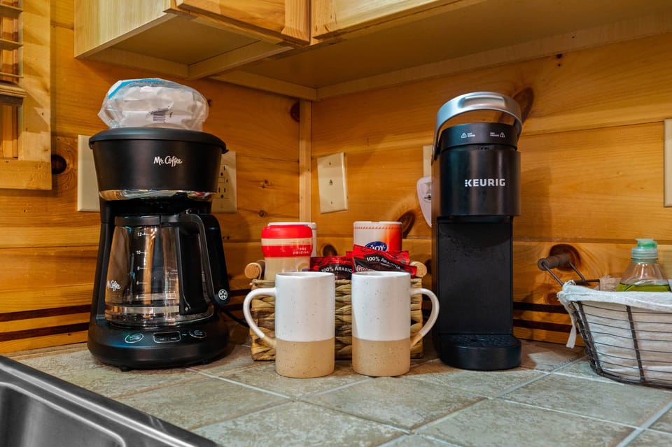 Coffee station with a regular coffee pot or a single cup Keurig.