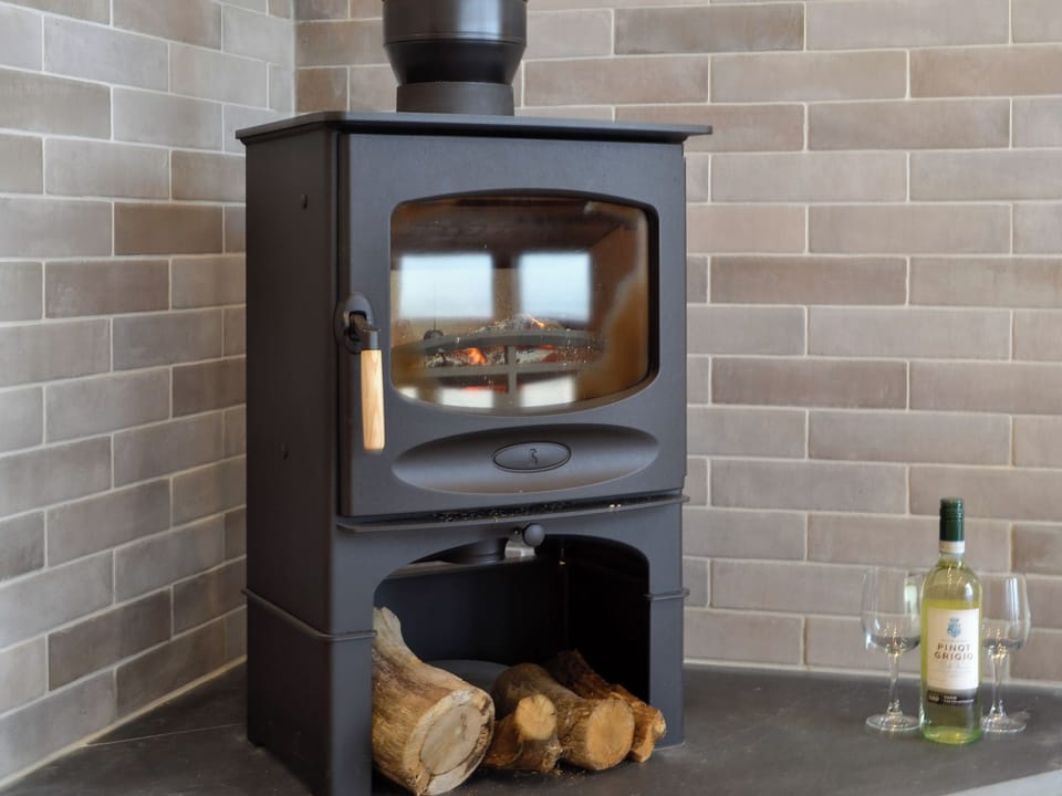 Woodburning stove to keep those evening chills at bay | Sweet Meadow Lodge - The Lodges, Howey, near Llandrindod Wells