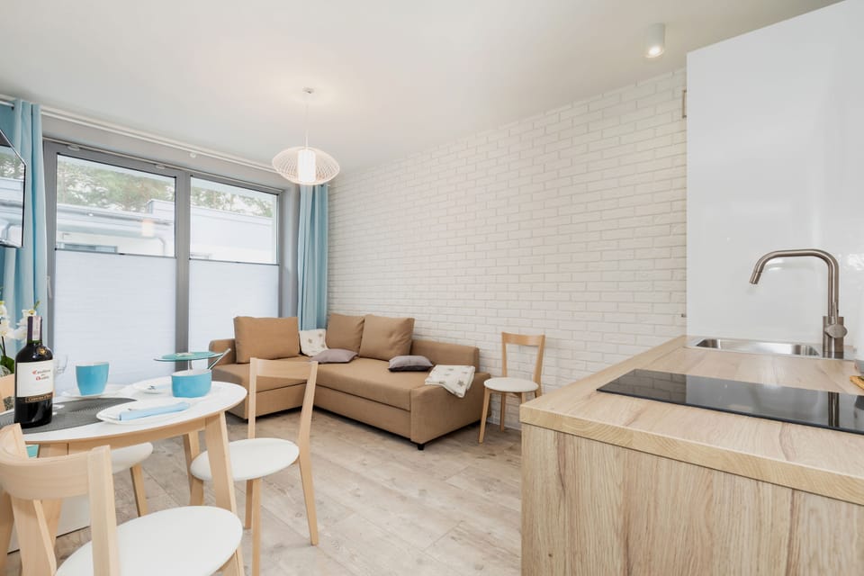 Deluxe Apartment, 1 Queen Bed with Sofa bed, Courtyard View | 1 bedroom, premium bedding, in-room safe, individually decorated