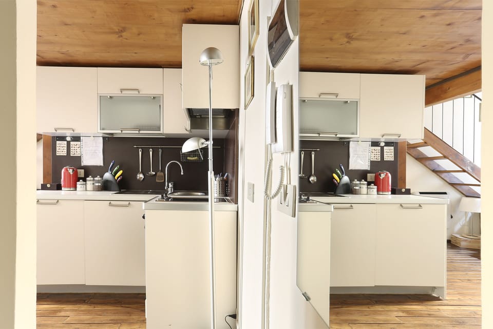 Apartment, 1 Bedroom | Private kitchen | Full-size fridge, stovetop, electric kettle, cookware/dishes/utensils