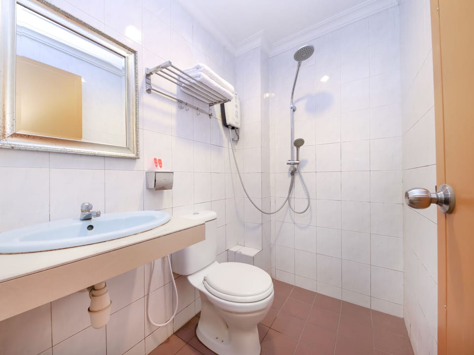 Shower, slippers, bidet, towels