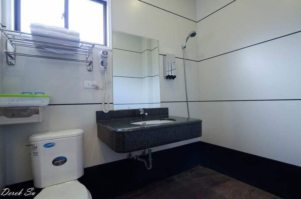 Shower, free toiletries, hair dryer, slippers