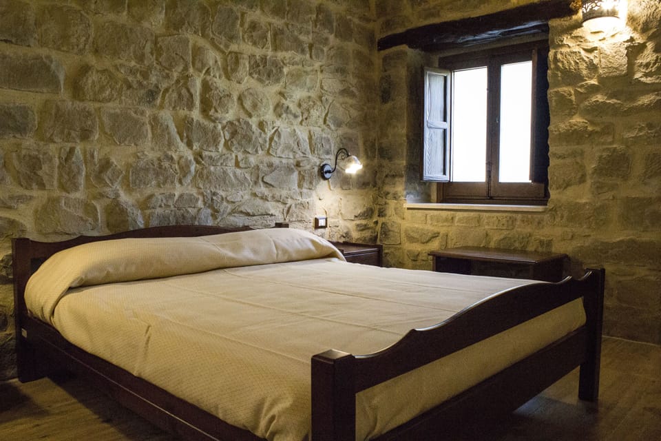 Double Room, Garden View (Larice) | Down comforters, minibar, in-room safe, individually decorated