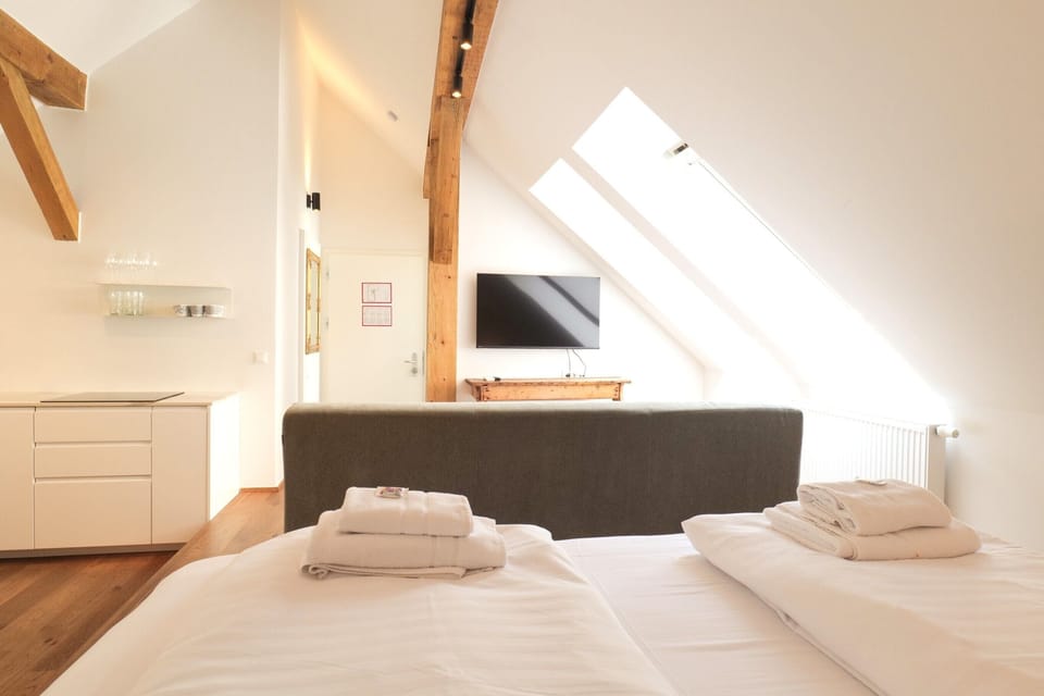 Superior Studio, Courtyard View | Living area | Flat-screen TV