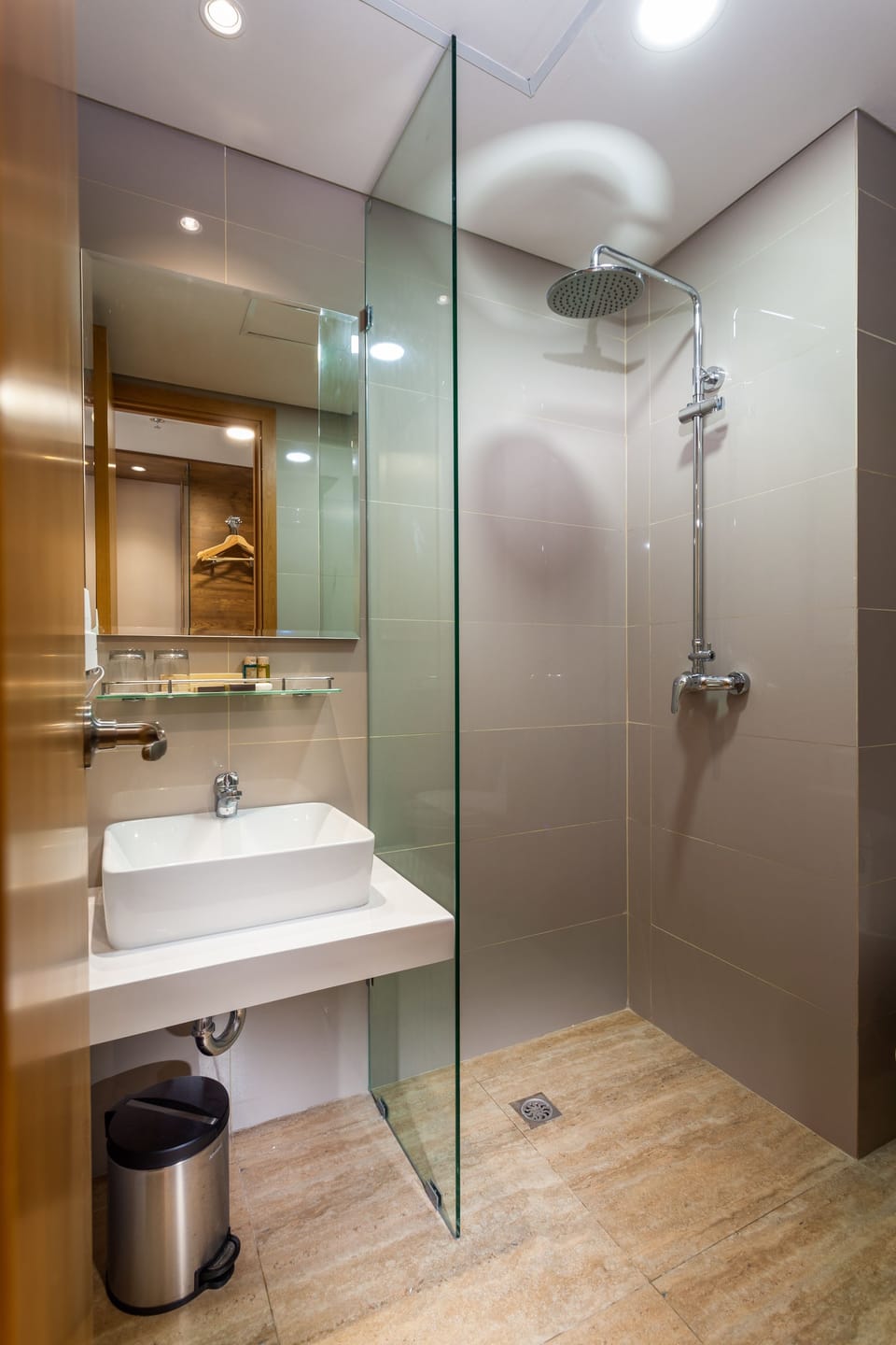 Shower, free toiletries, slippers, towels
