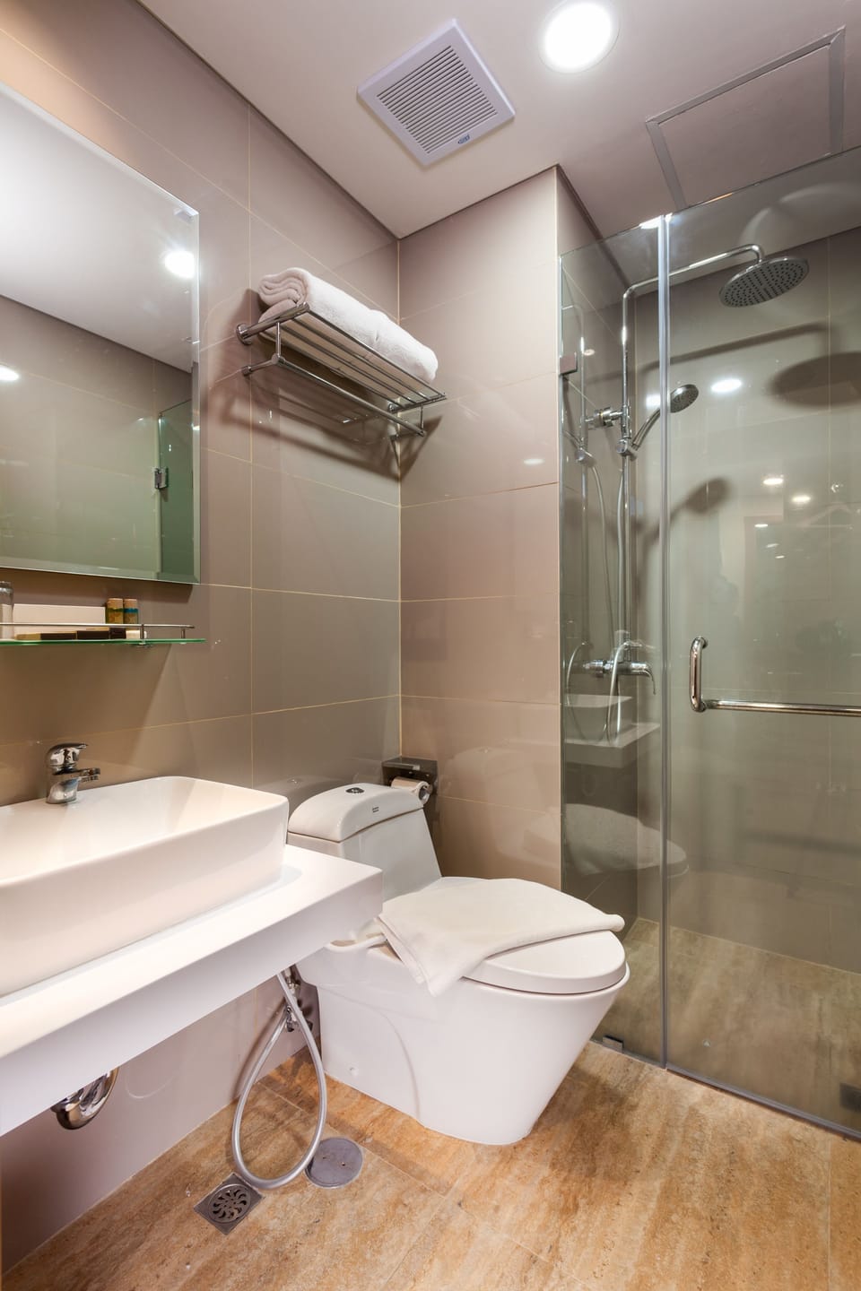 Shower, free toiletries, slippers, towels