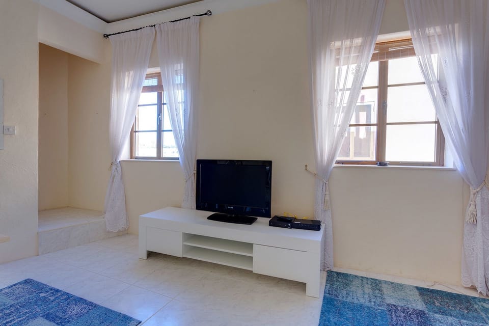 House, 1 Bedroom | Living area | TV