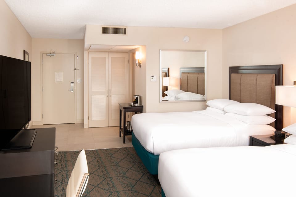 Premium bedding, pillowtop beds, minibar, in-room safe