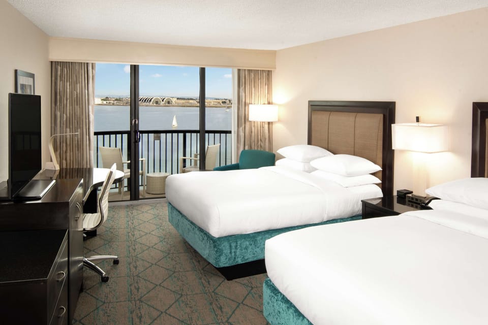 Premium bedding, pillowtop beds, minibar, in-room safe