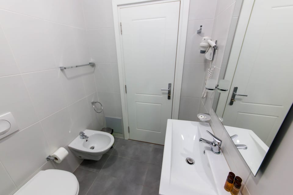 Deluxe Double or Twin Room, Balcony, Sea View | Bathroom | Shower, free toiletries, hair dryer, bathrobes