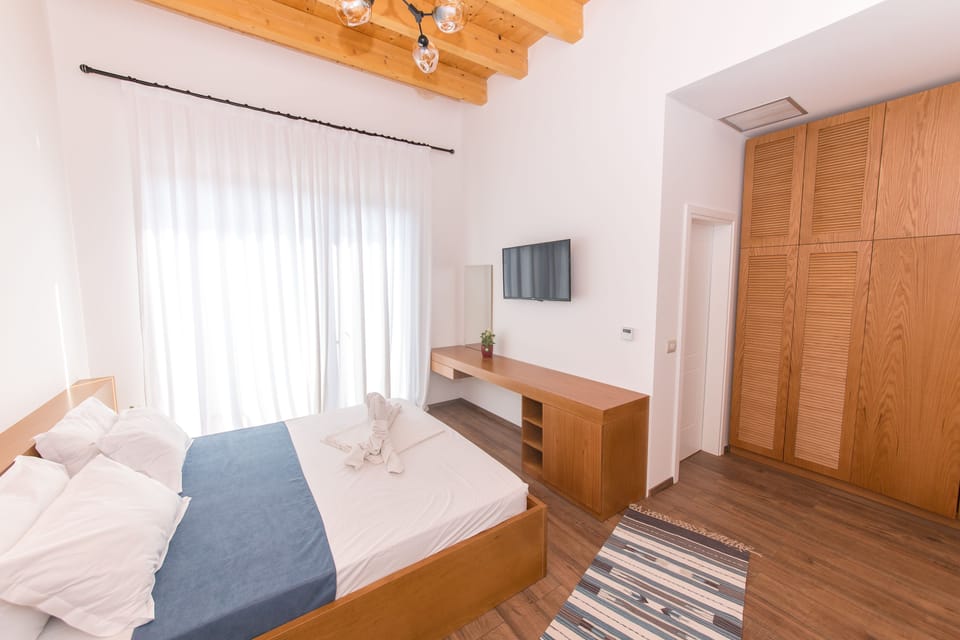 Family Room, Balcony, Sea View | Minibar, in-room safe, desk, soundproofing