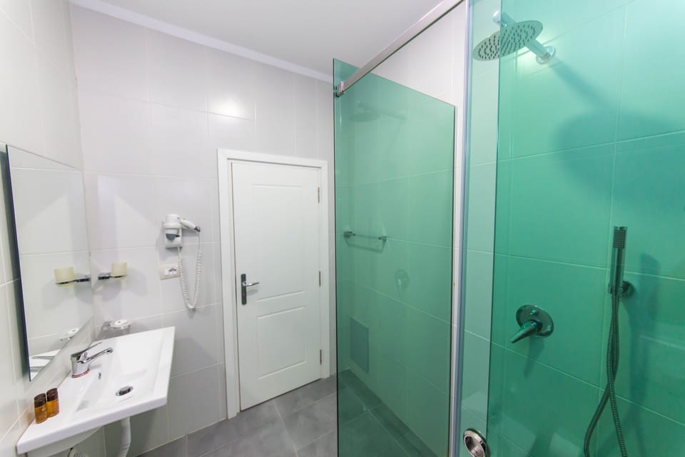 Shower, free toiletries, hair dryer, bathrobes