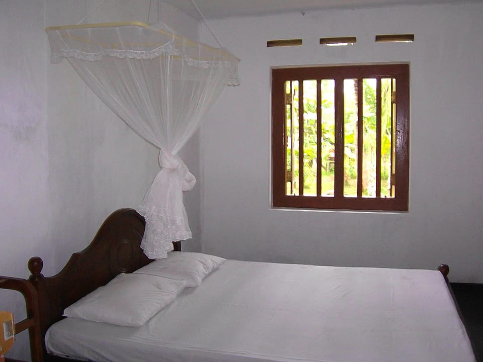 Economy Double Room, 1 Queen Bed, Garden View | 2 bedrooms, free WiFi