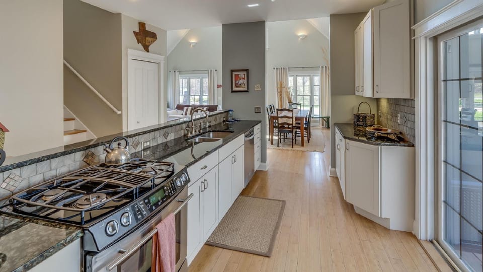 Bright, spacious kitchen with modern appliances and natural light