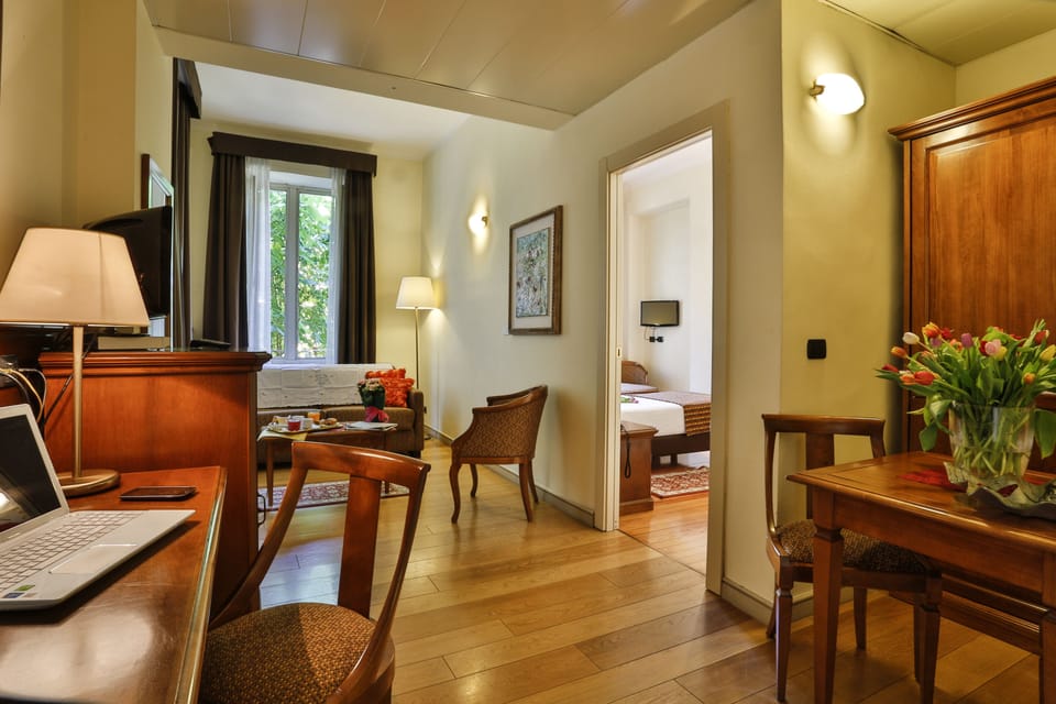 Hypo-allergenic bedding, down comforters, minibar, in-room safe