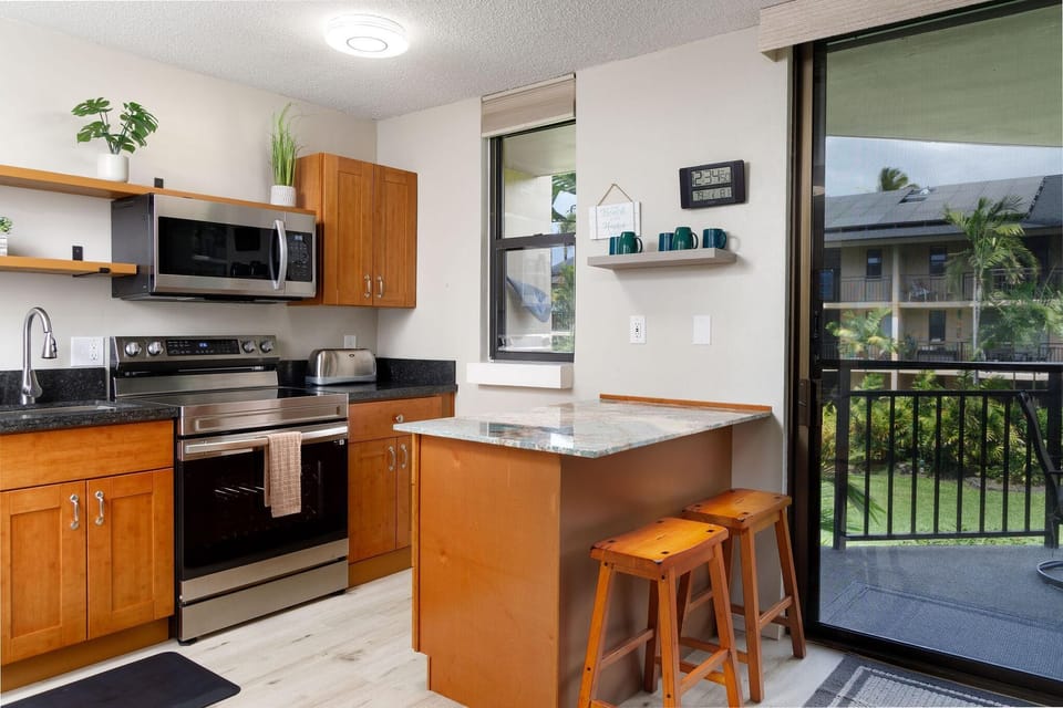 Condo, 1 King Bed (Kona Makai 3-203) | Private kitchen | Fridge, microwave, stovetop, dishwasher