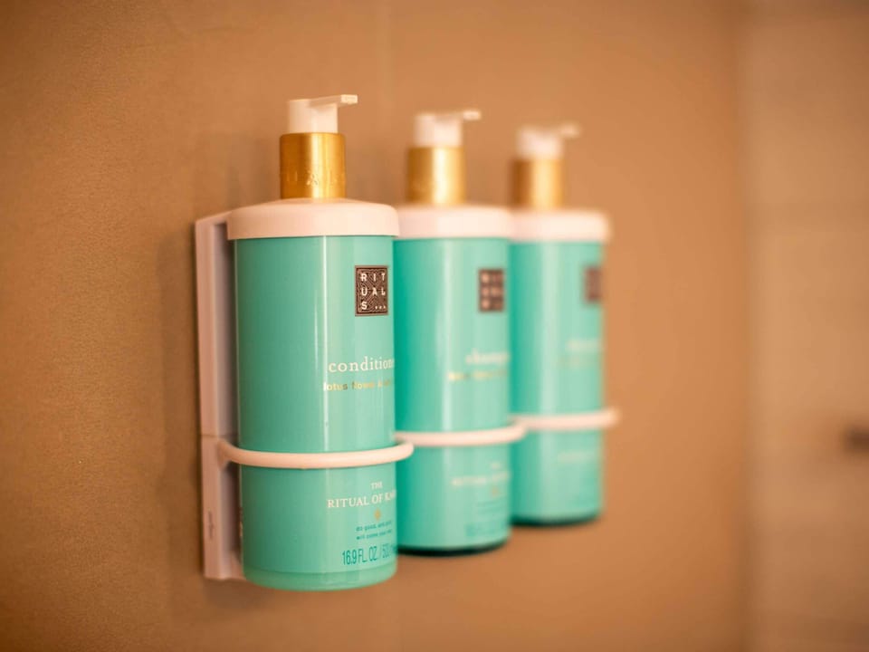 Eco-friendly toiletries, hair dryer, towels, shampoo