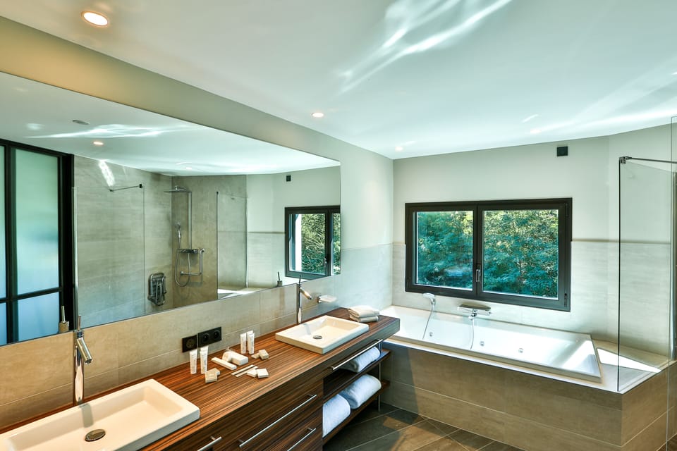 Designer toiletries, hair dryer, bathrobes, slippers